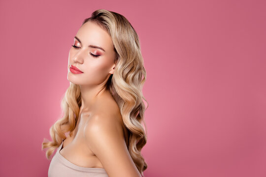 Photo of pretty feminine girl with long hollywood wave hair enjoy fresh clean beauty procedure on pastel background