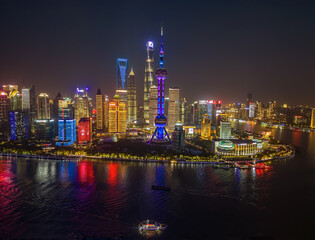 Fototapeta na wymiar The drone aerial view of Lujiazui, Pudong, Shanghai at night time. Lujiazui is the largest financial zone in mainland China. 