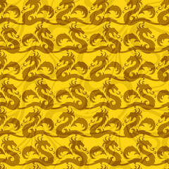 Fototapeta na wymiar The seamless yellow background with dragons. 