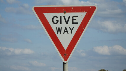 Give way road sign
