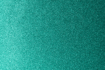 turquoise glitter background with gradiant from left to right background