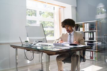 African American Accountant Manager Doing Accounting