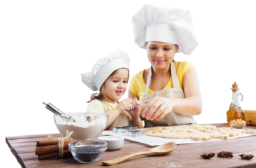 Happy mother and children cooking in the kitchen