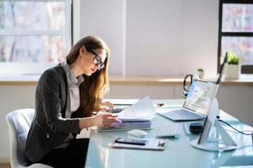 Accountant Using Electronic Invoice Or Bill