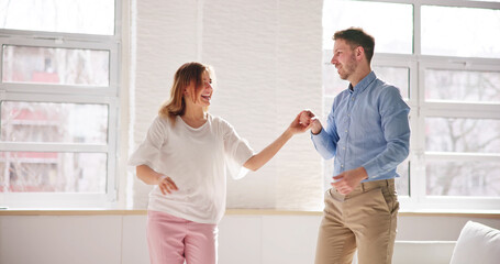Fototapeta premium Excited Family Couple Dancing. People Dance