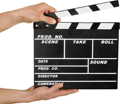 Human hand holds movie clapper board