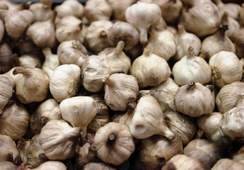 Black garlic clove background