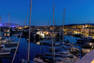 View over Port Grimaud marina in France in spring with yachts and sailing boats at night