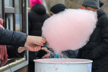 Cooking cotton candy in the park