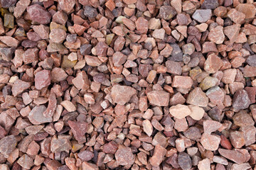 Texture of decorative red stone grey marble crumb