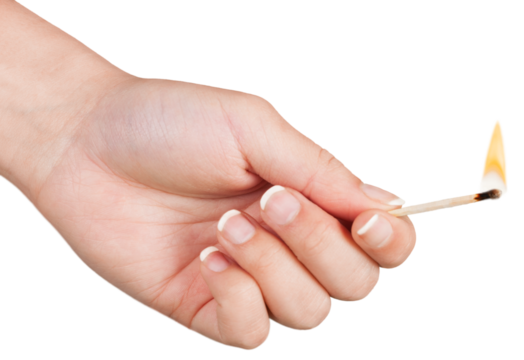 Burning Match in woman hand
