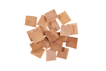 Overhead view of Japanese White Sandalwood chips (Santalum album), isolated on white background