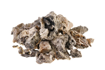 Pile of saumerio, a black copal tree resin from Peru, isolated on white background