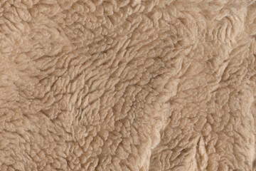 Beige wool texture background. plush. mohair. fur