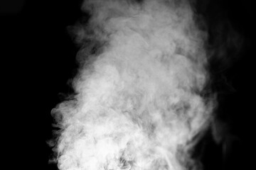 Fragments of abstract white smoke isolated on black background. steam cloud close up