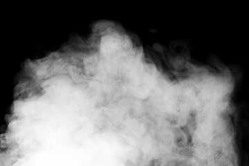 Fragments of abstract white smoke isolated on black background. steam cloud close up