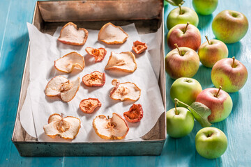 Homemade and sweet dried apples made of fresh fruits.