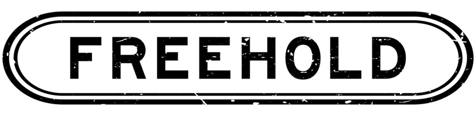 Grunge black freehold word rubber seal stamp on white background