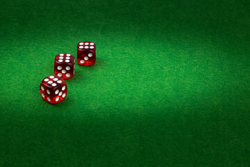 Dice on green felt, gambling background concept
