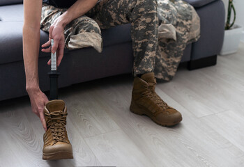 soldier after leg amputation is rehabilitated and recovers thanks to the prosthesis