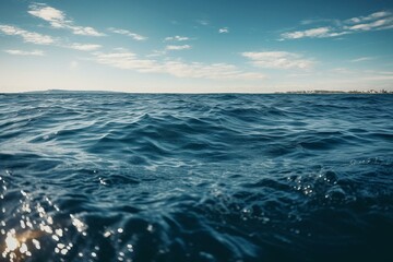 Fototapeta na wymiar Blue ocean with natural sky backdrop on ocean surface. Generative AI