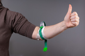 Fototapeta premium Tourniquet used when puncturing peripheral veins. Congestion bleeding occurs, making it easier to draw blood.