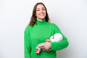 Young caucasian woman with her cute baby isolated on white background smiling a lot