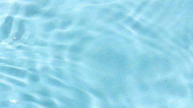 Water surface on light blue background