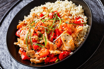 sweet and sour chicken with veggies and rice
