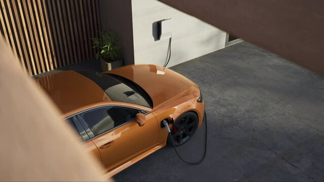 Generic electric vehicle EV hybrid car is being charged from a wallbox on a contemporary modern residential building house