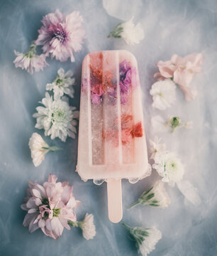 Ice pop with flowers. AI generated image.