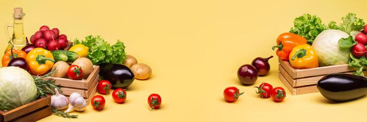 Cabbage, onions, potatoes, cucumbers, peppers, garlic, tomatoes, eggplant, lettuce on a yellow background. Vegetable oil. Harvest.