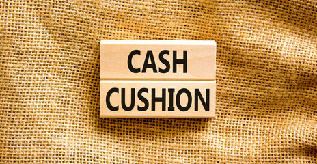 Cash cushion symbol. Concept words Cash cushion on beautiful wooden block. Beautiful canvas table canvas background. Business and Cash cushion concept. Copy space.