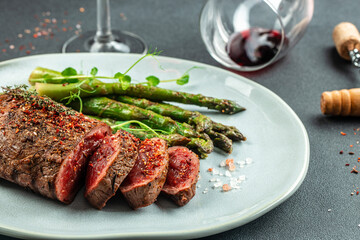 Beef steak and red wine. Grilled meat on wooden cutting board. banner, menu, recipe place for text, top view