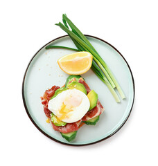 Plate with tasty egg Benedict isolated on white background