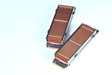 vareity of solid state drives with copper heat sink for computer - ssd sata, NVME PCIe, SATA SSD m key, b key isolated on white background.
