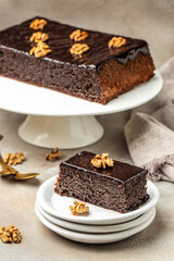 Poppy seed cake with nut served on a plate, banner, menu, recipe place for text, top view