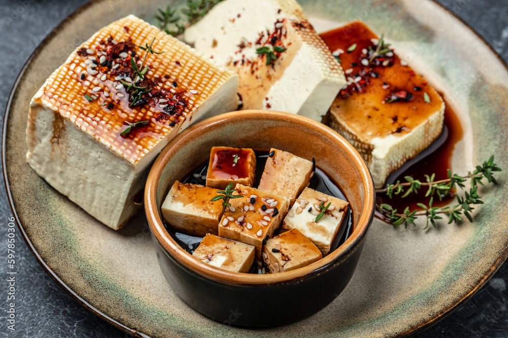 Canvas Prints marinated tofu with herbs and spices. Healthy vegan meatless meal rich in protein and calcium. Food recipe background. Close up