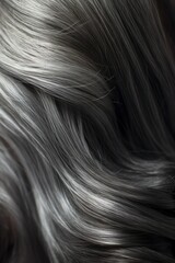 Naklejka premium A closeup view of a bunch of shiny straight gray hair in a wavy curved style. Generative AI