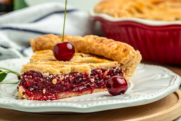 slice of cherry pie, Flaky Crust, piece on a plate and the whole homemade cherry pie, Long banner format. top view