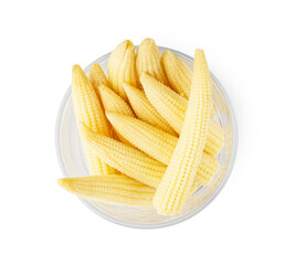 Glass of tasty canned corn cobs on white background