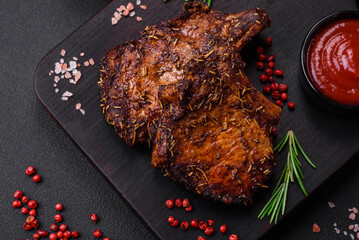 Delicious beef or pork steak on the bone grilled with spices and rosemary