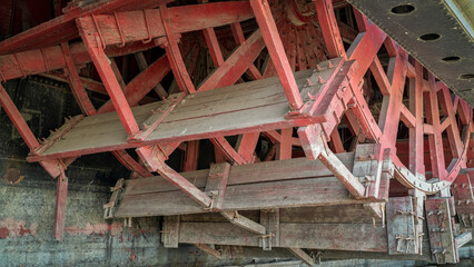 detail of wooden paddle wheel of Captain Meriwether Lewis sidewheeler dredge displayed in a dry...