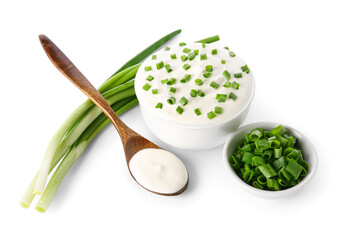 Fototapeta na wymiar Bowls of tasty sour cream with green onion on white background