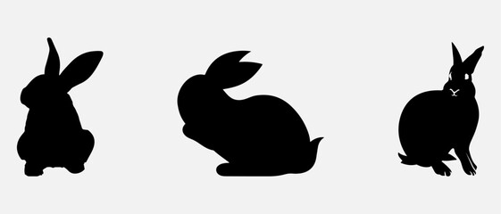 isolated black silhouette of a rabbit , vector collection