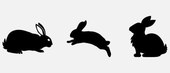 isolated black silhouette of a rabbit , vector collection