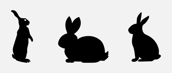 isolated black silhouette of a rabbit , vector collection
