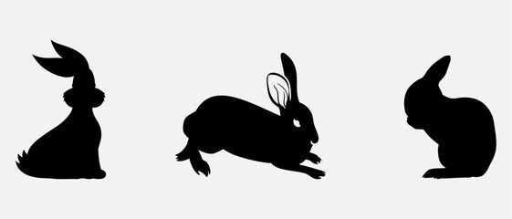 isolated black silhouette of a rabbit , vector collection
