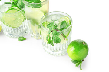 Glasses of tasty mojito isolated on white background