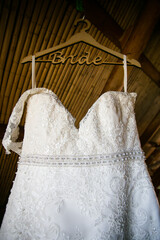 Fototapeta na wymiar Creative and Stunning Wedding Dress Photography of a real wedding dress at a real wedding